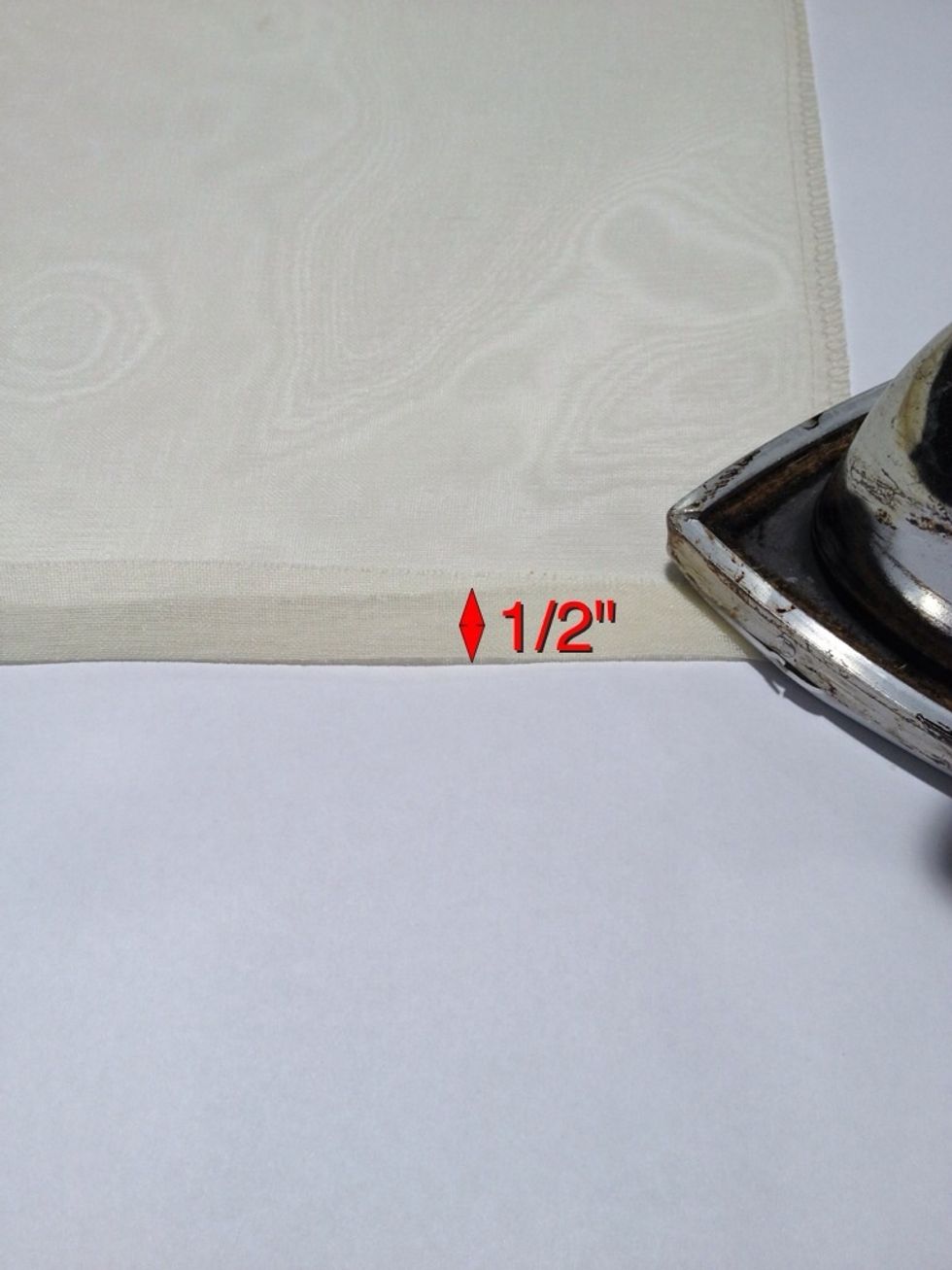 If you have to cut the length of the panels, you will need to hem the cut end. Turn up 1-2" along raw edge. This will be the bottom of the panel.