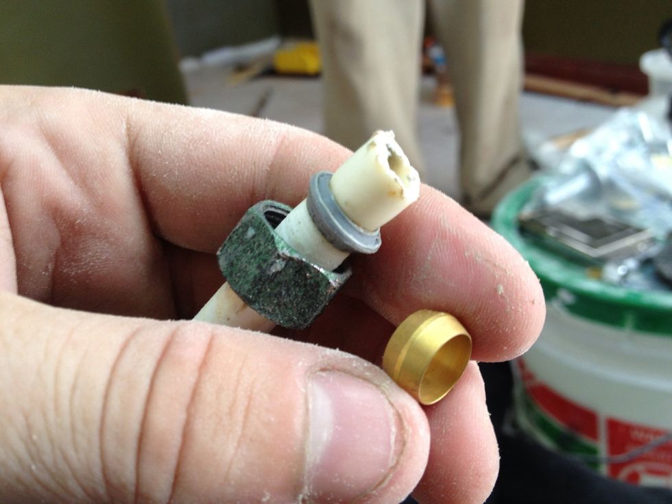 If you have to replace the housing, the hose is small so the metal collar slides over the end of the hose & the brass ring (or plastic ring like the old one on the hose in the picture) goes on next.