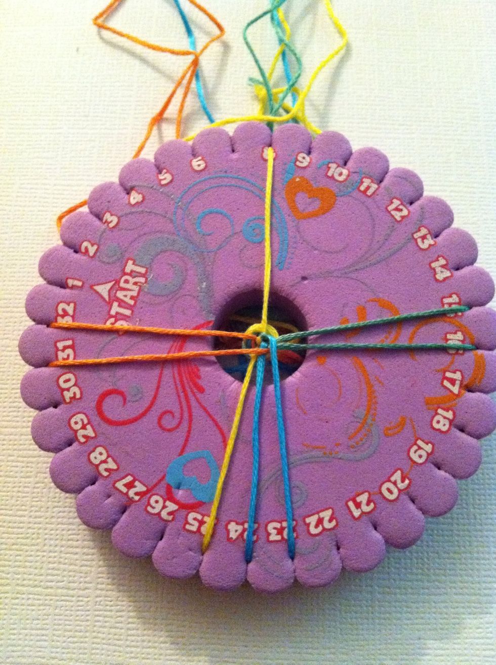 If you have to stop in the middle, bring you first string down, like the picture. This will help you remember where you left off.