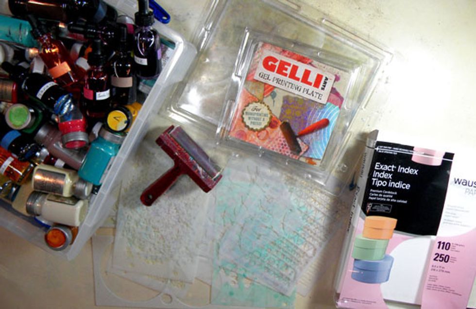 If you haven't tried the Gelli Arts Printing Plate, you are missing out!  They come in many sizes, but for this project, I used the 8"x10" plate. Grab a brayer and a stack of paper and lets go!