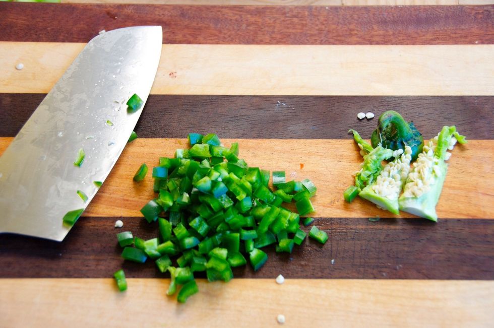 If you like a little more spice then don't remove the seeds.  Otherwise, remove the seeds and dice the jalape\u00f1o as pictured above...