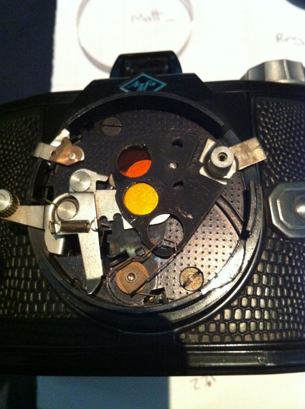 If you love working with black & white, & are making a permanent change to the camera, you can install filters instead of the close up lens. Some people remove this, but it's handy to have.