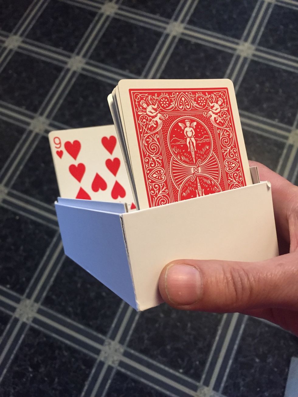 If you need a greater distance between the lenses and the screen to get in focus. Add some card stock or playing cards to give the distance you need to focus.