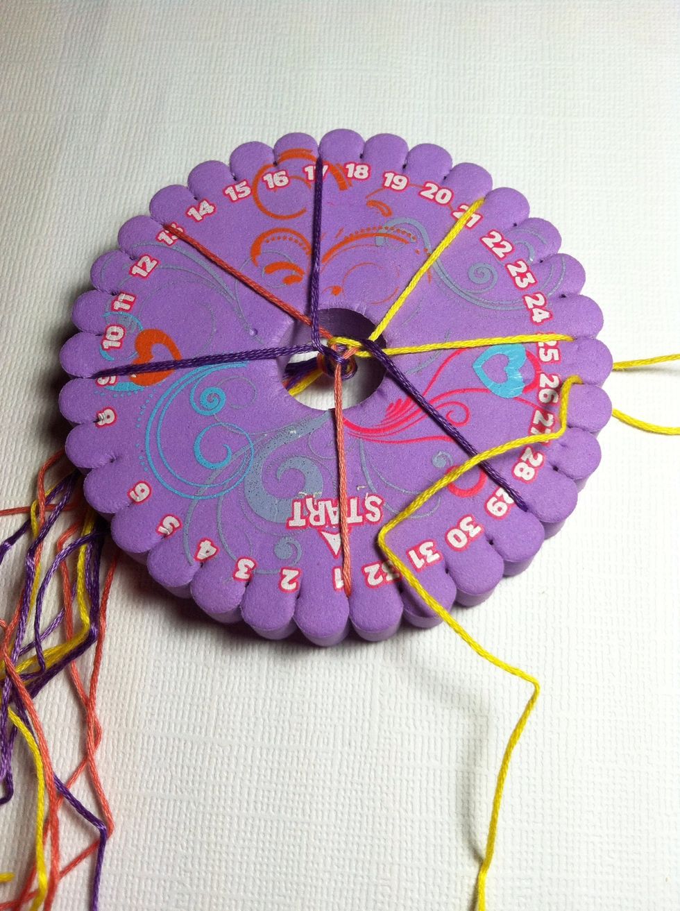 If you need to stop, you should be able to pick up your place easily, but if you think you may get confused, slide your working string into the next slot to keep your place.