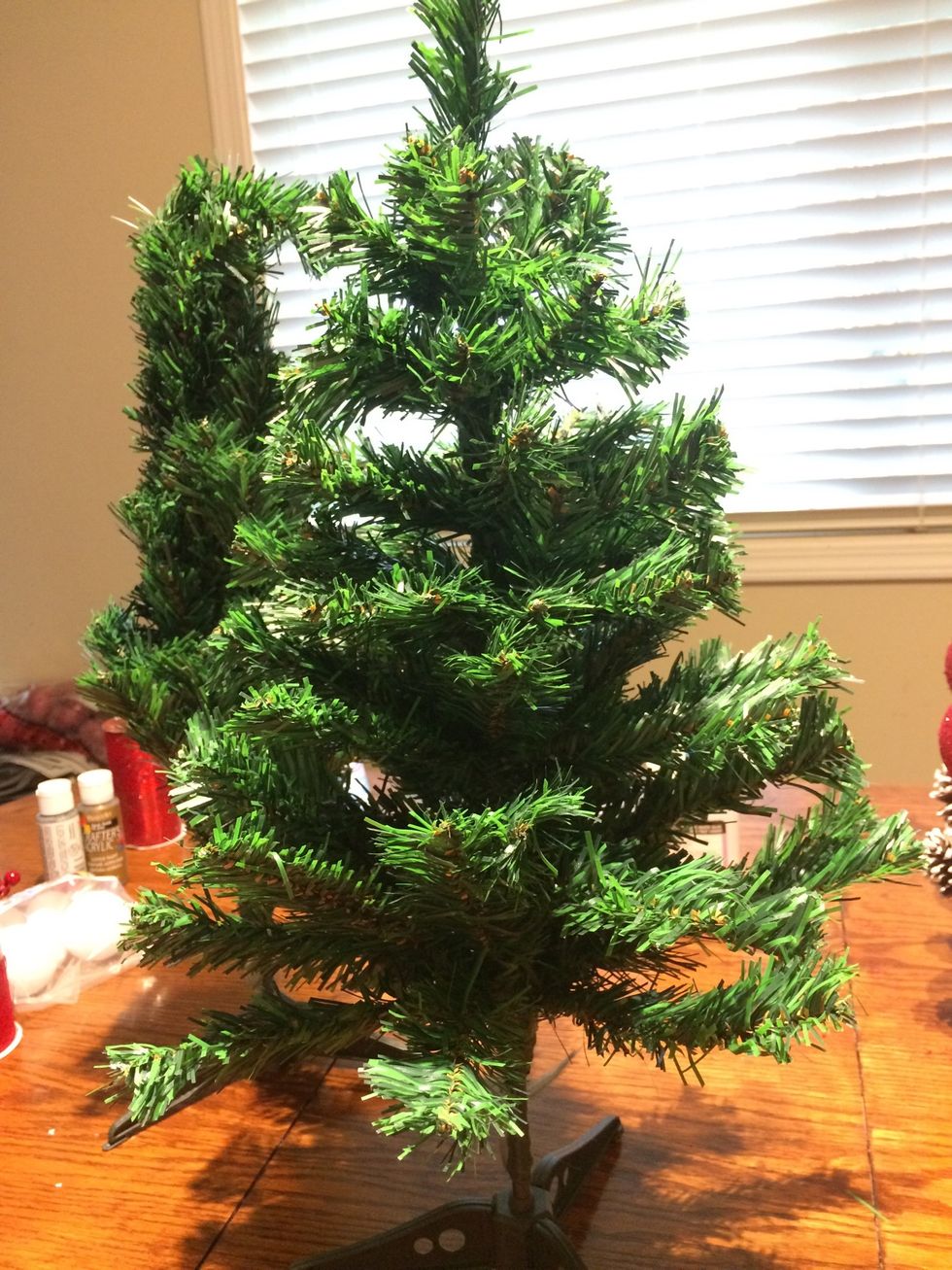 If you purchased fake trees, open up the branches and fluff the tree.