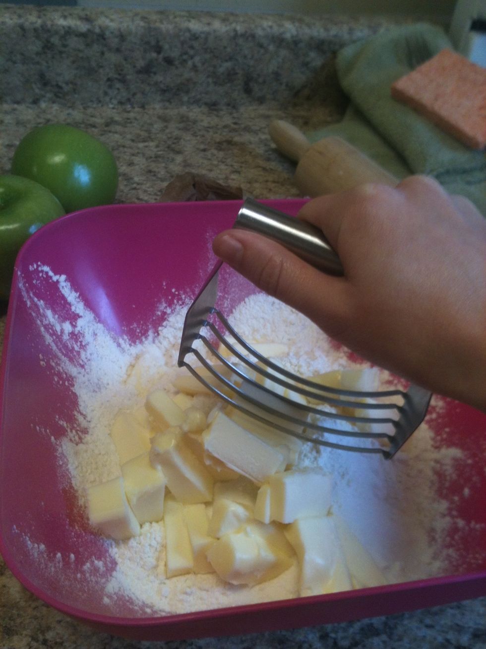 If you're a poor college student like me, you have to combine everything by hand. But it's easier to use a cusinart or a kitchenmaid.