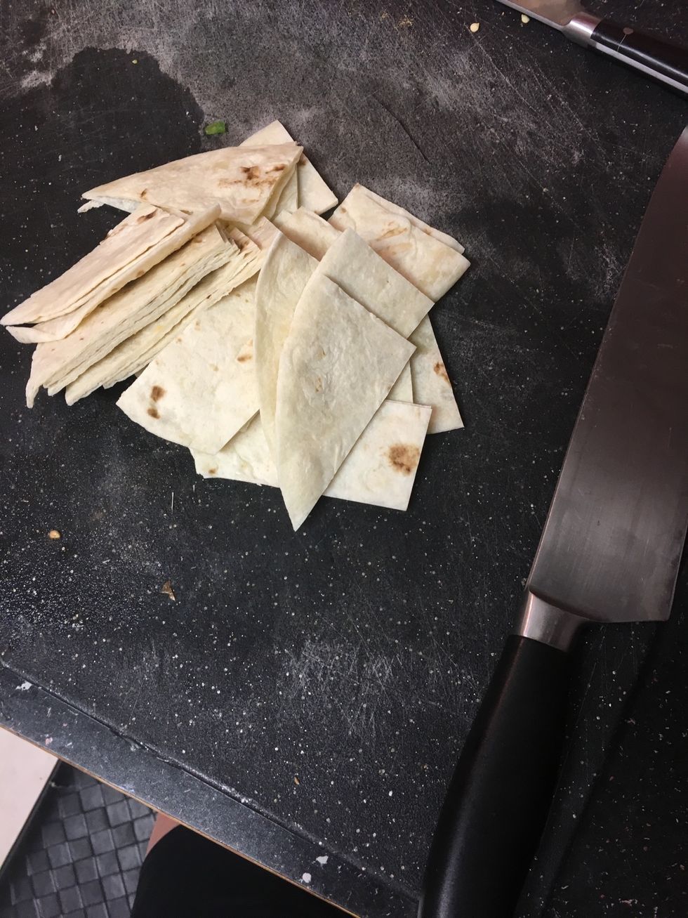If you're feeling a little crafty fry up some home made chips. Take a couple flour tortillas and cut them as large as you want your chips to be.