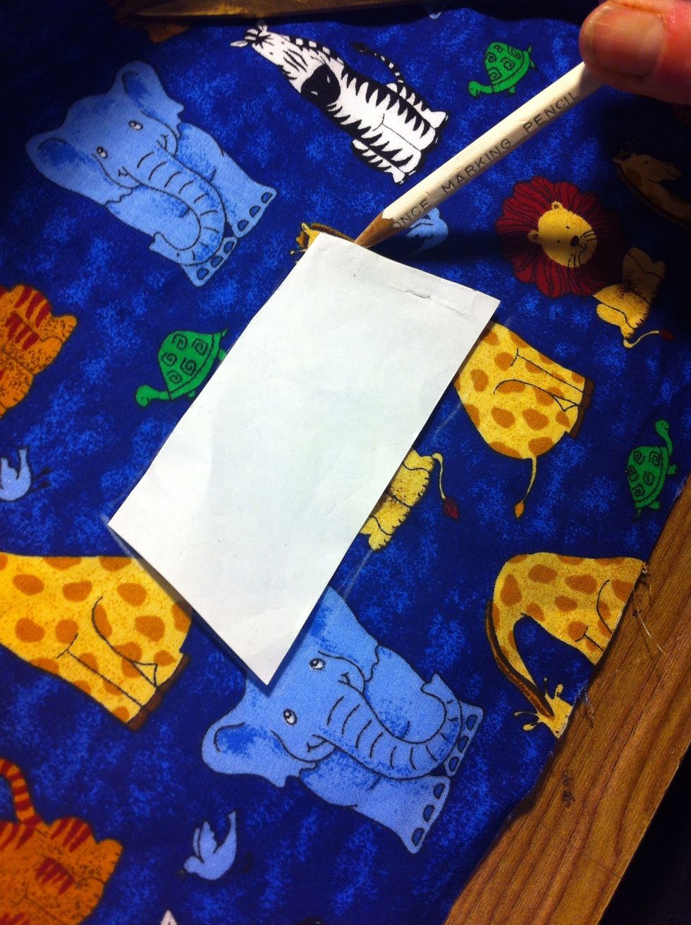 (If you're fixing the back part of your TOMS.) Trace a patter over the selected areas and cut them out.