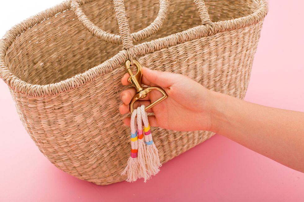 If you're looking to add a little color to your basket, click the link to learn how to create your own colorful custom tassels in minutes: http://go.brit.co/1rqveT8