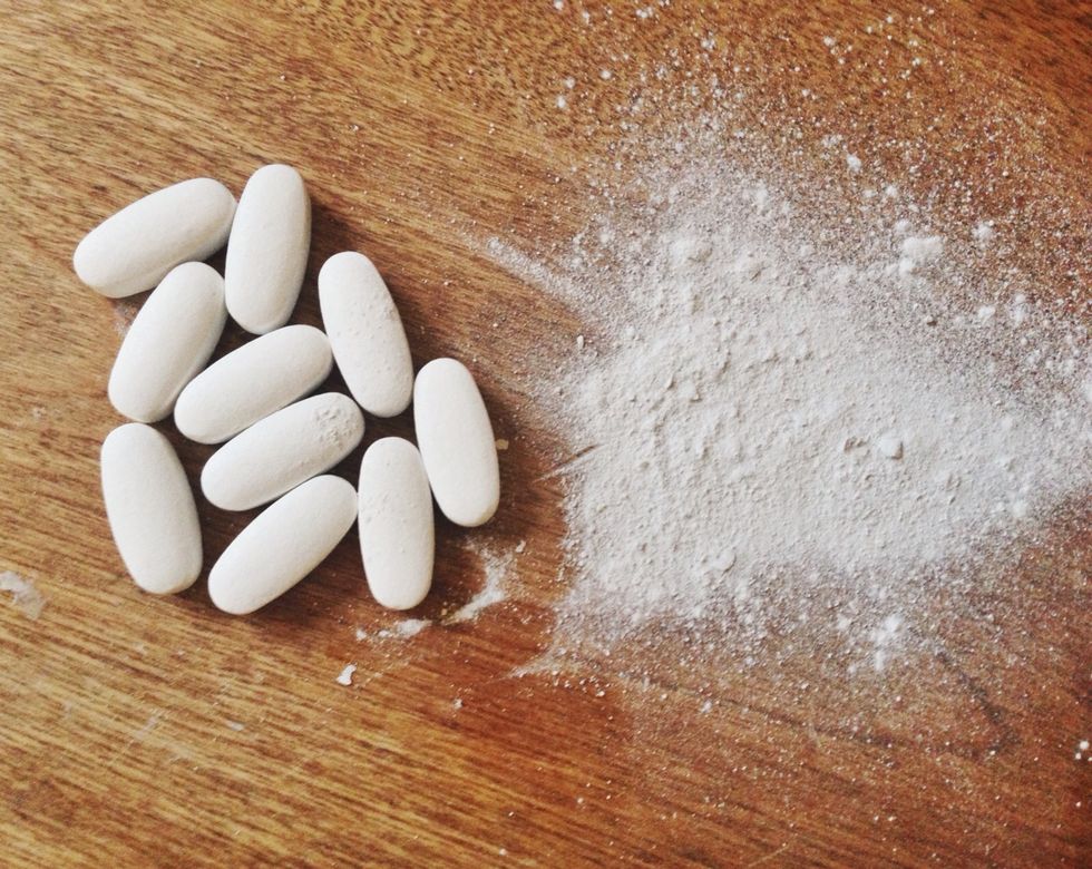 If you're starting with calcium tablets or capsules start by crushing them into a powder or dumping the capsules contents into a bowl.