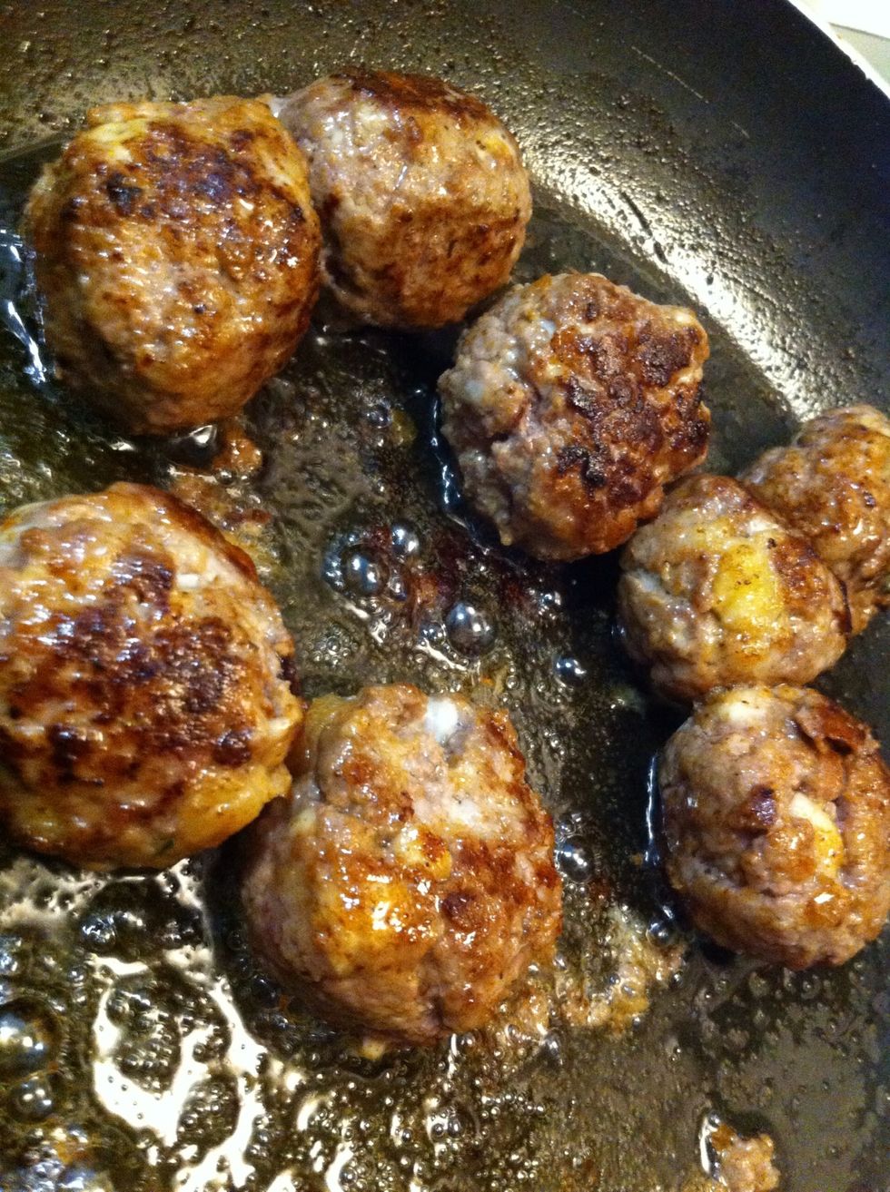 If you're unsure of the cook time, split one open and check (you'll just have to sample one...poor you!) Repeat in groups of about 8 meatballs per round.