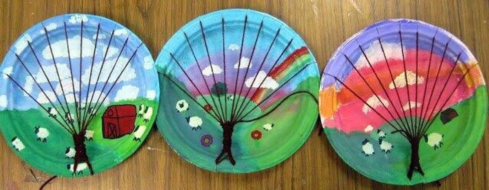 If you run out of yarn, double knot a new piece to the old. Once your trunk is tall enough, tie it off on a tree branch. You may cut the leftover tail of yarn. Now your tree is ready for weaving!