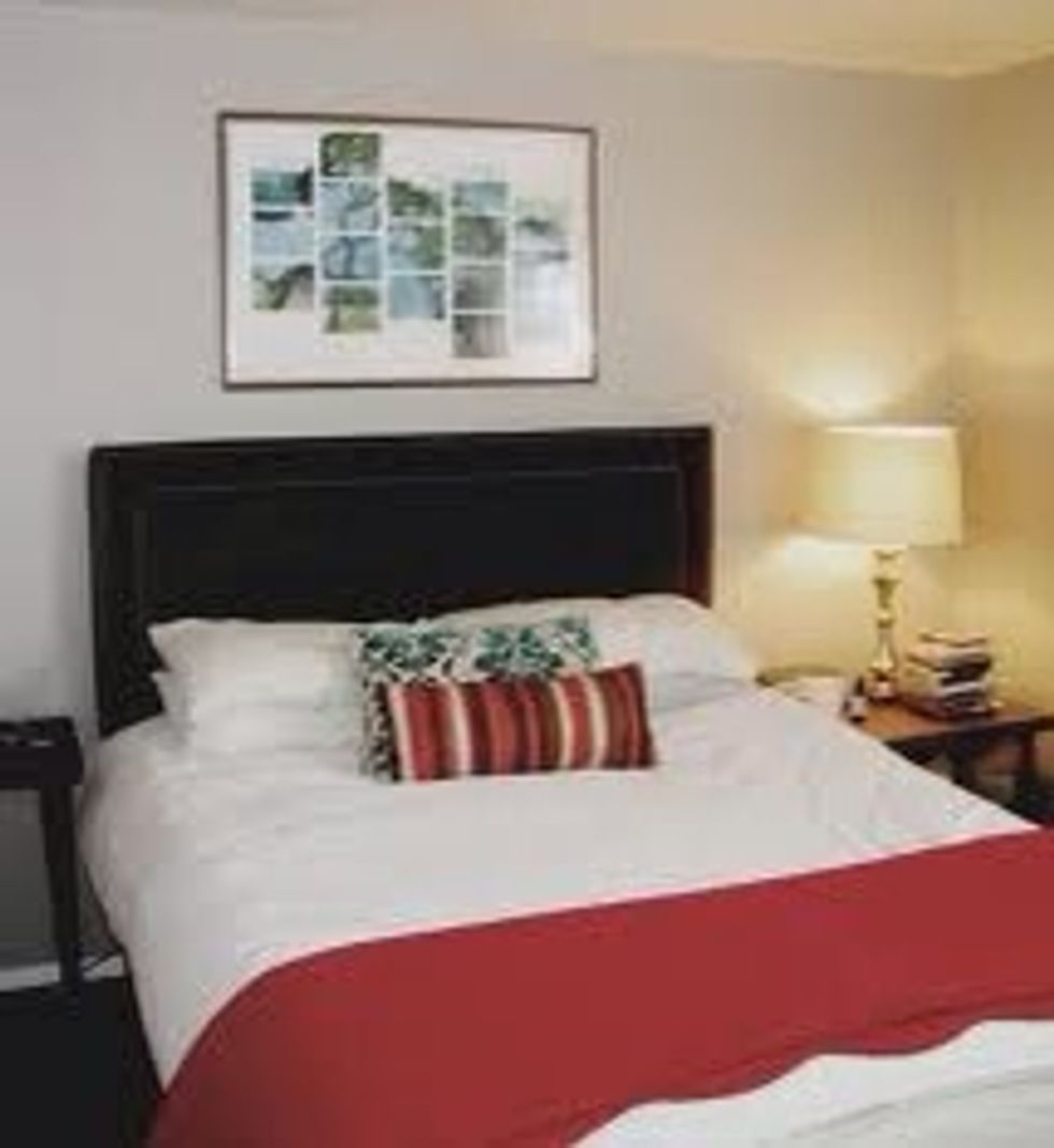 If you sleep in a bed, when you get up in the morning make your bed. Cover the whole bed with the cover, then place pillows on bed frame. http://tinyurl.com/mhmoc8j