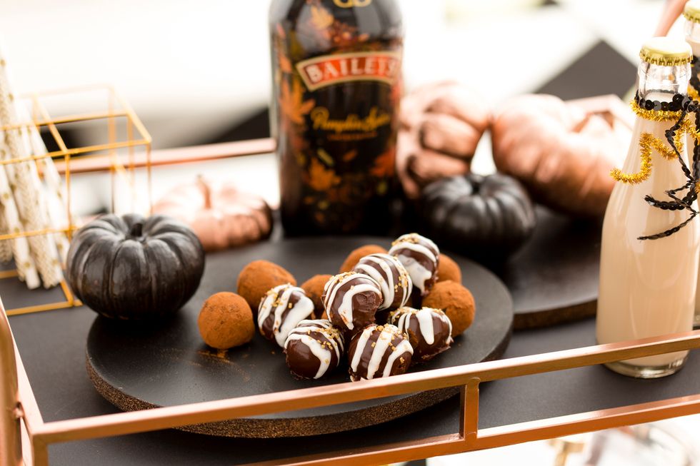 If you\u2019re tackling adulthood like the rest of us and are planning on throwing a Halloween soir\u00e9e, you\u2019re in luck! We teamed up with Baileys to make easy truffles that will be a hit at your party.