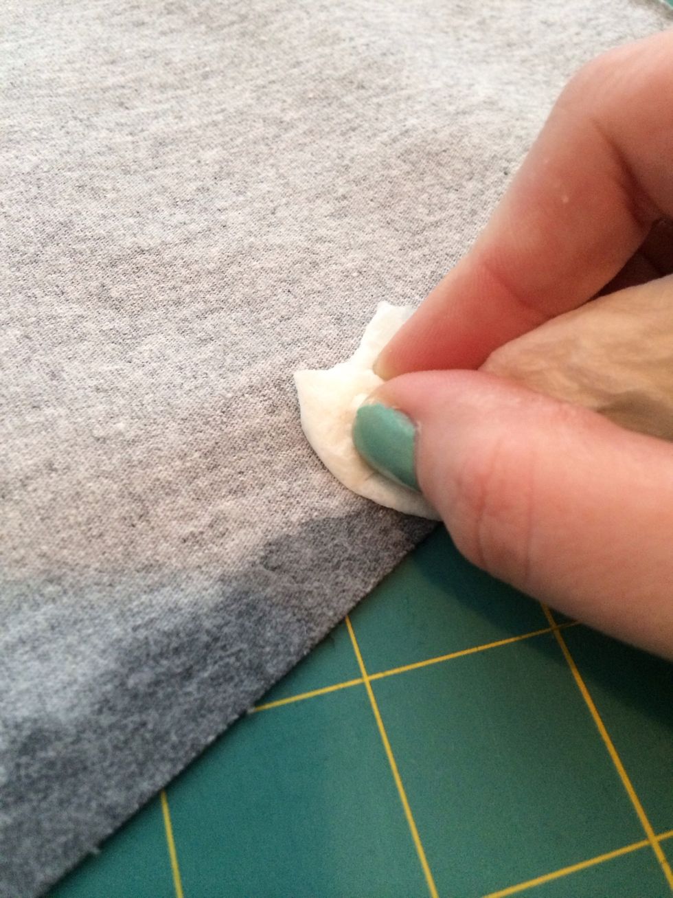 If you use a water-soluble marker you can simple wet the shirt to remove the ink. If not, you can flip the fabric over. I do not advise sharpies!