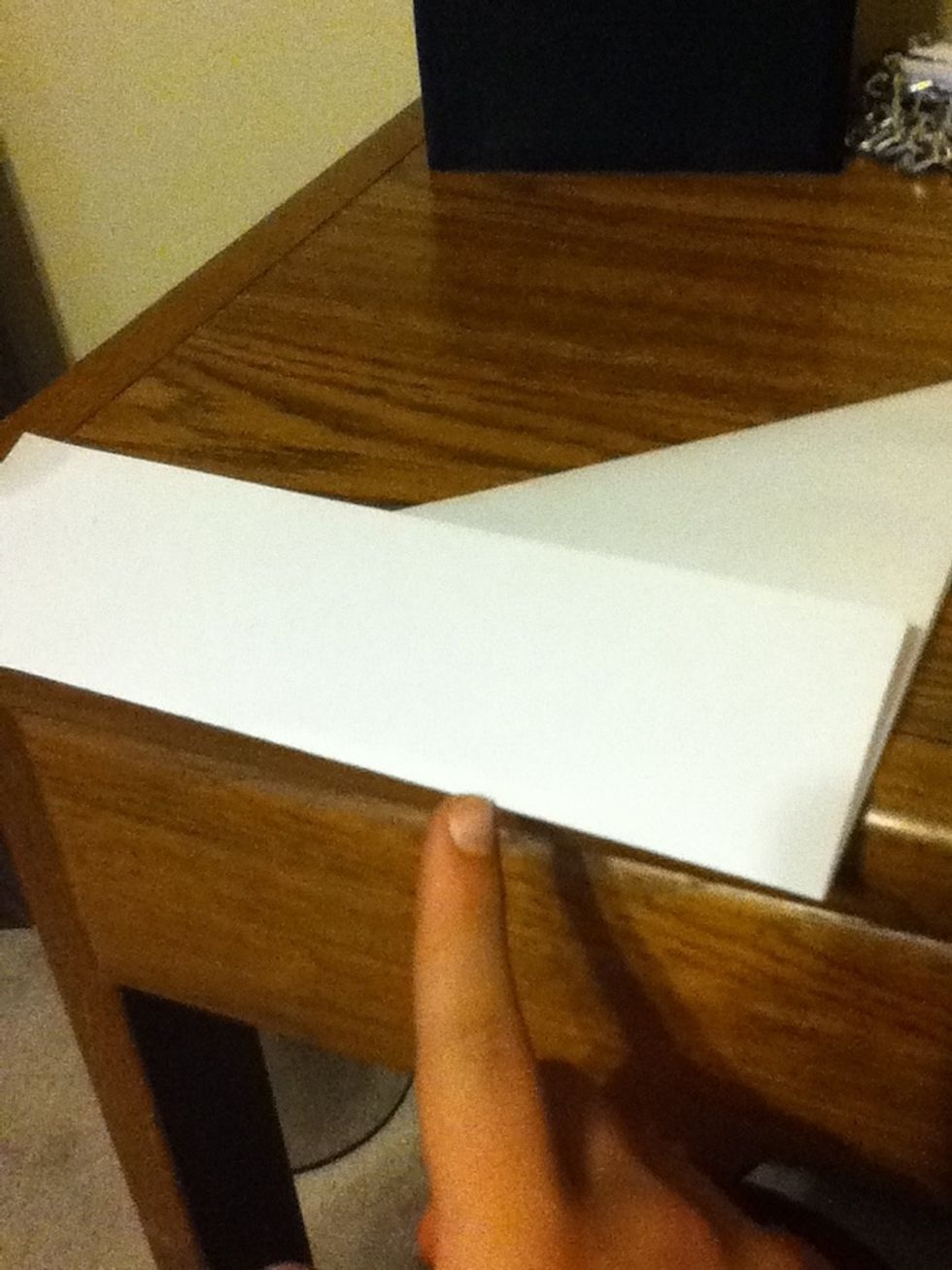 If you want a nice clean rip lick the paper along this edge.