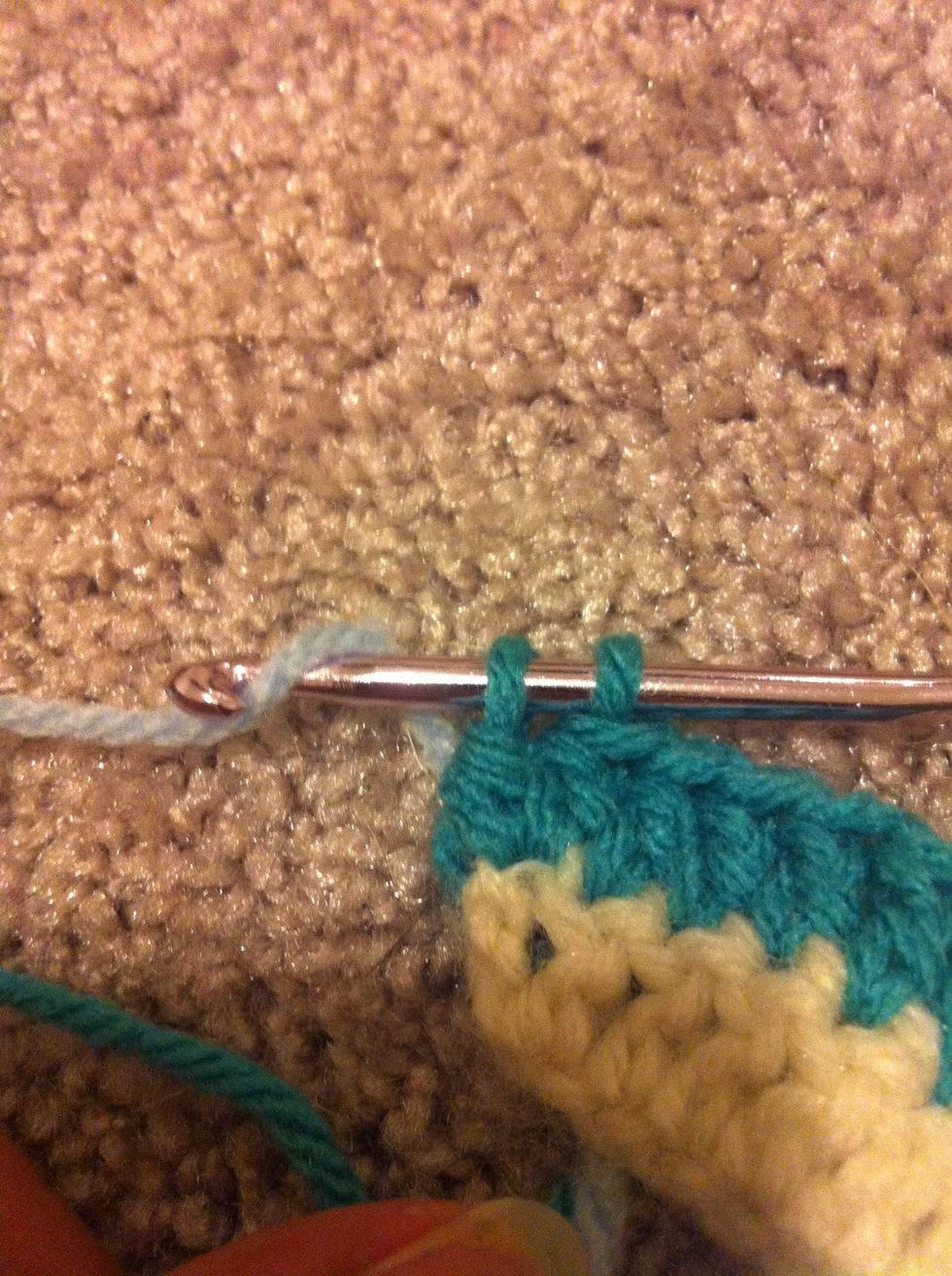 if you want to change the color again just do like between the 1st and 2nd row. if not: just finish the second double crochet, chain 3, turn and keep working :)