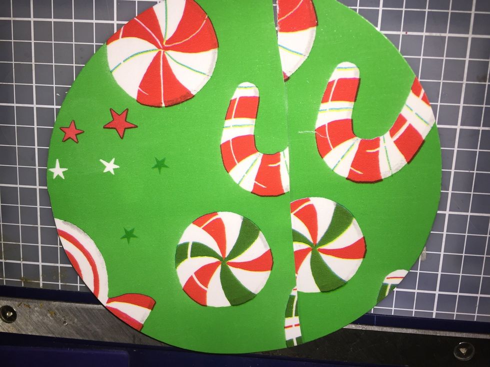 If you want to hide the ties in back you can cut some wrapping paper to hot glue over the back. The teacher in me laminated the wrapping paper to help it last a little longer.