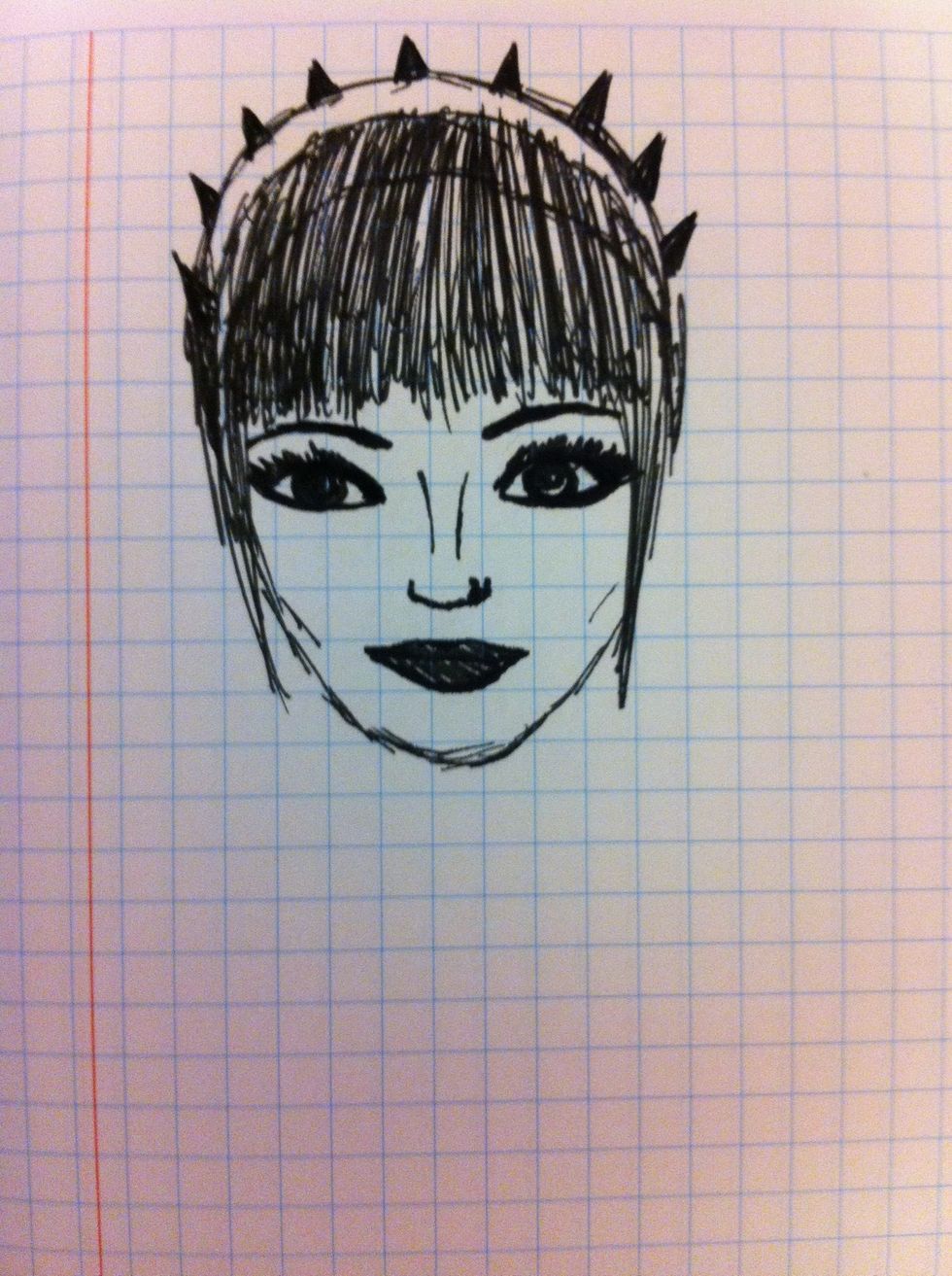 If you want you can add a hair accessorize just like I did. I drew a spiky head band.