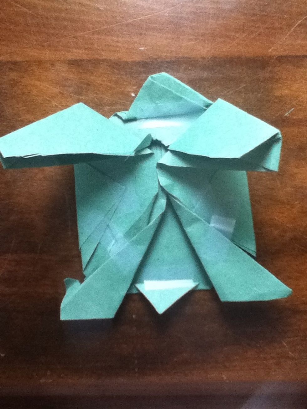 If you were using construction paper (like I was) tape everything down in order to keep it from unfolding. Origami paper is recommended, but you CAN use construction paper.