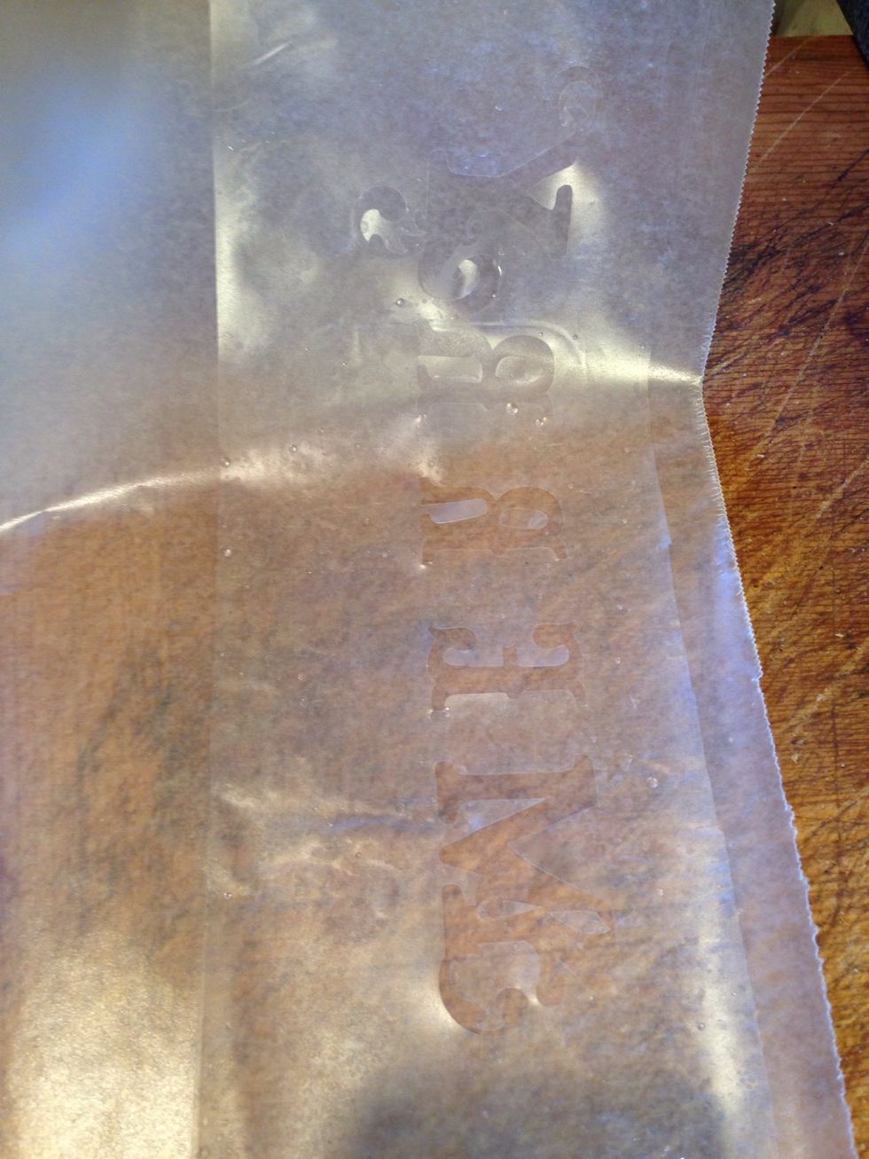 If you wish to save your cut image, gently place it on the waxed paper.