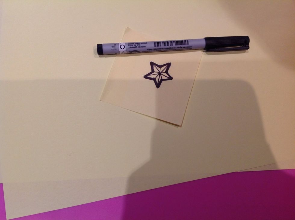 If you would like to add a star at the top of your tree, then draw a five pointed star on yellow or gold paper and cut it out.