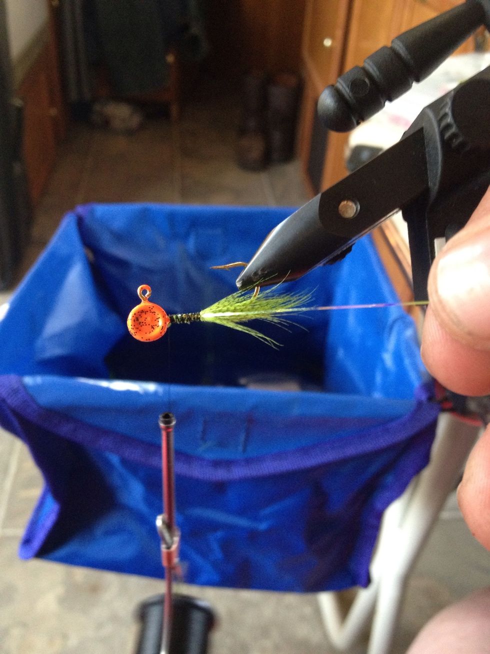 If you would like you can add tinsel along the side to mimic a minnow flash. "looks nice too" Anytime you finish a step it is wise to run your thread back towards the head so your ready for next step.