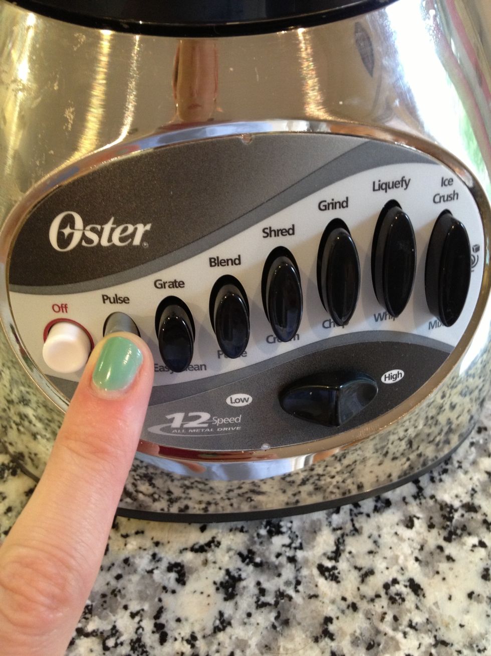 If your blender has various settings, "Pulse" it a few times to get all of the frozen bits to mix, then let it "Blend" until smooth