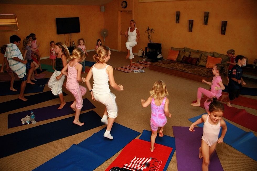 If your child is excited or off-center, engage him by running in place and punching out with the arms. "Let's get out all our energy...punch it out and breath out while you punch!"