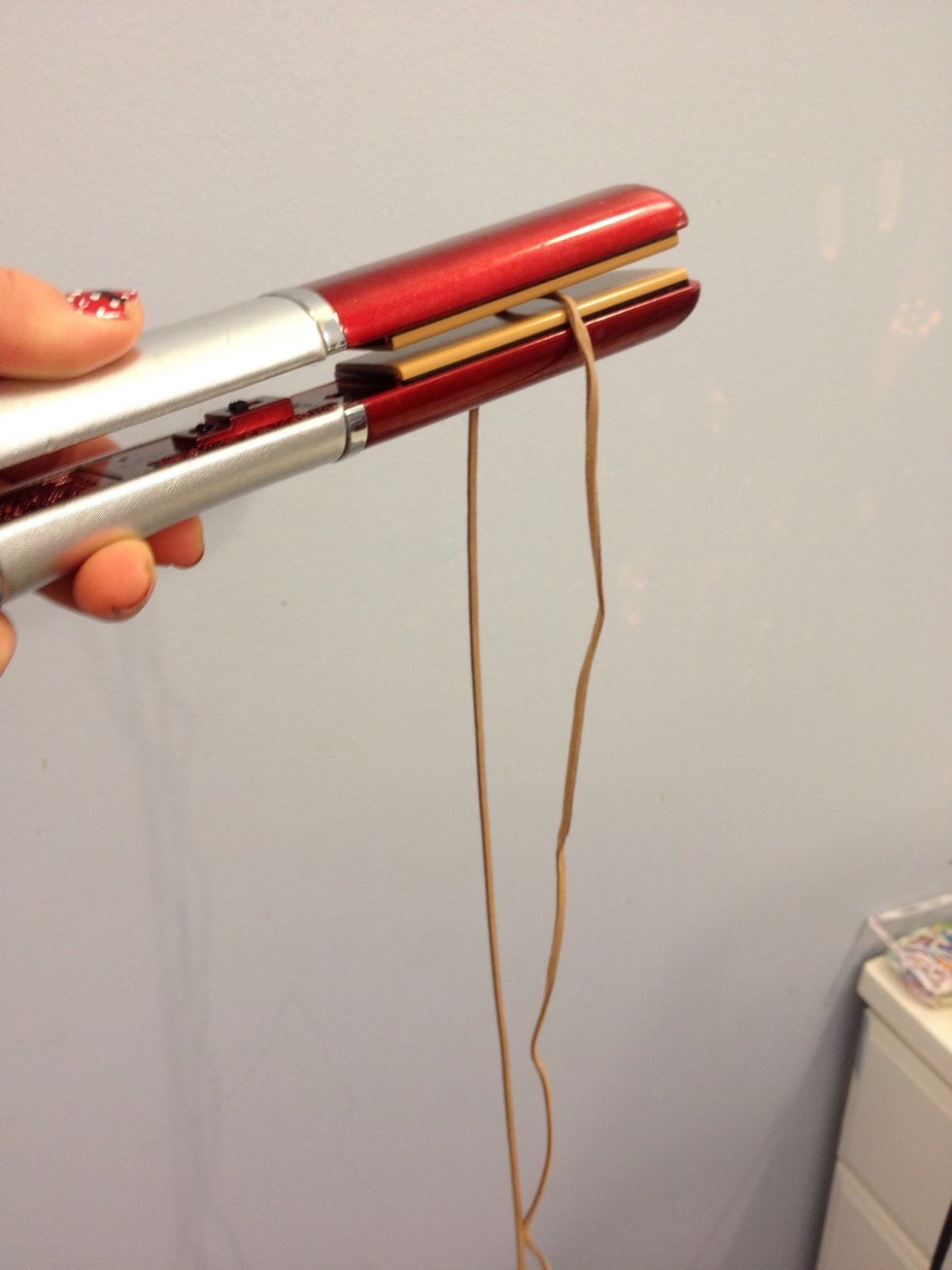 If your cord was crimped from how it was packaged, go over it once or twice with a flat iron.