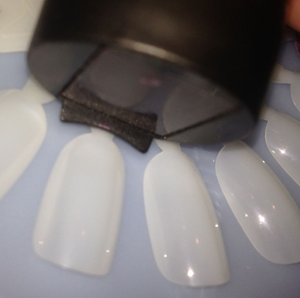 If your magnet has a guide, practice using it. Place behind the cuticle and then hold the magnet over the nail, very close but be sure not to touch it!