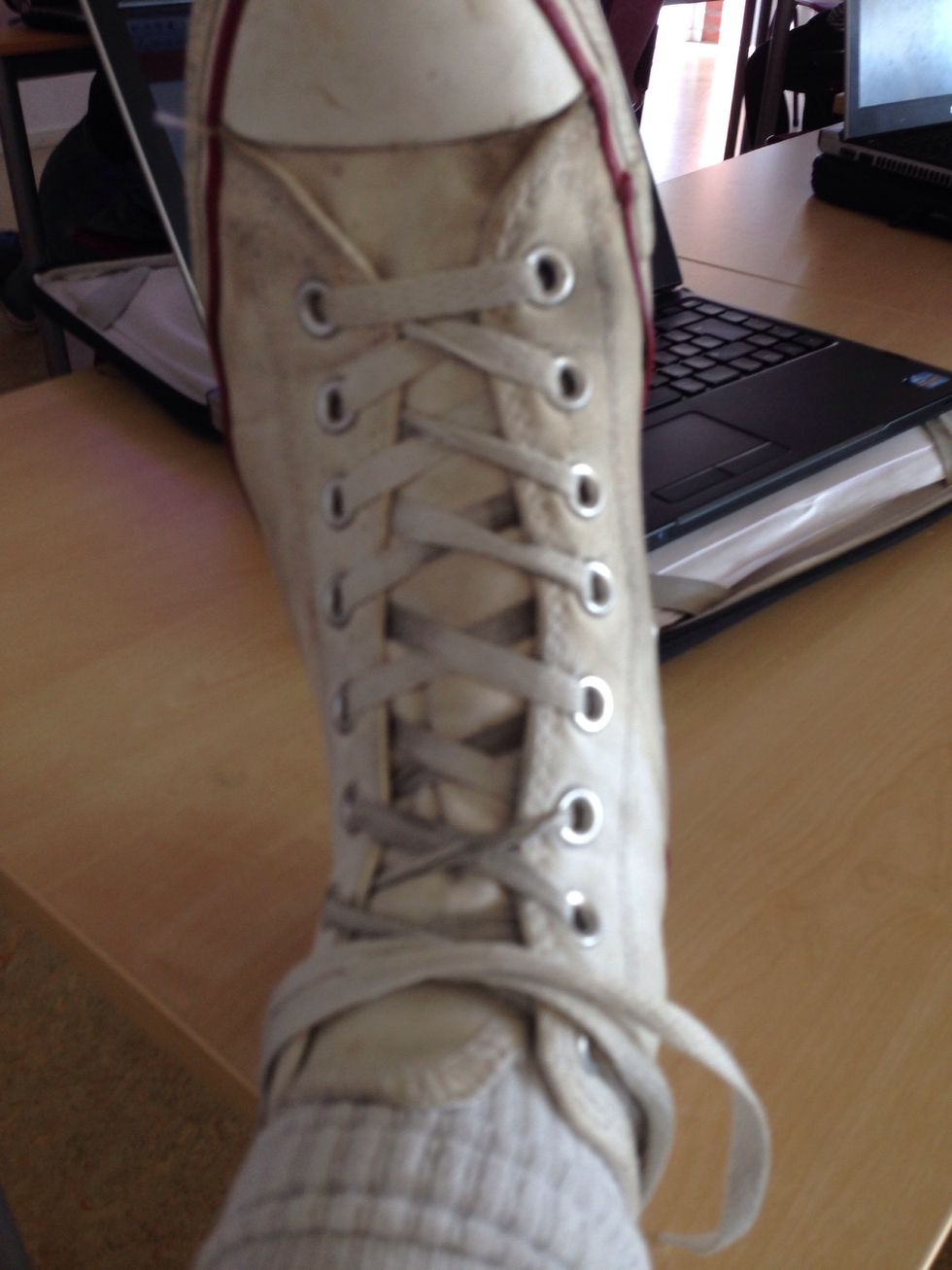 If your shoelaces are long, you might want to wrap them around your leg one lap, but if they are not, then you can just skip this step