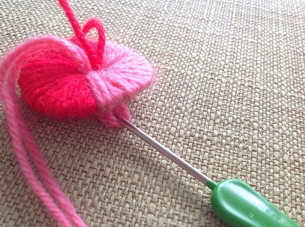 If your yarn is too thick for you to go through the hoop, you can use this to hook and pull it through.