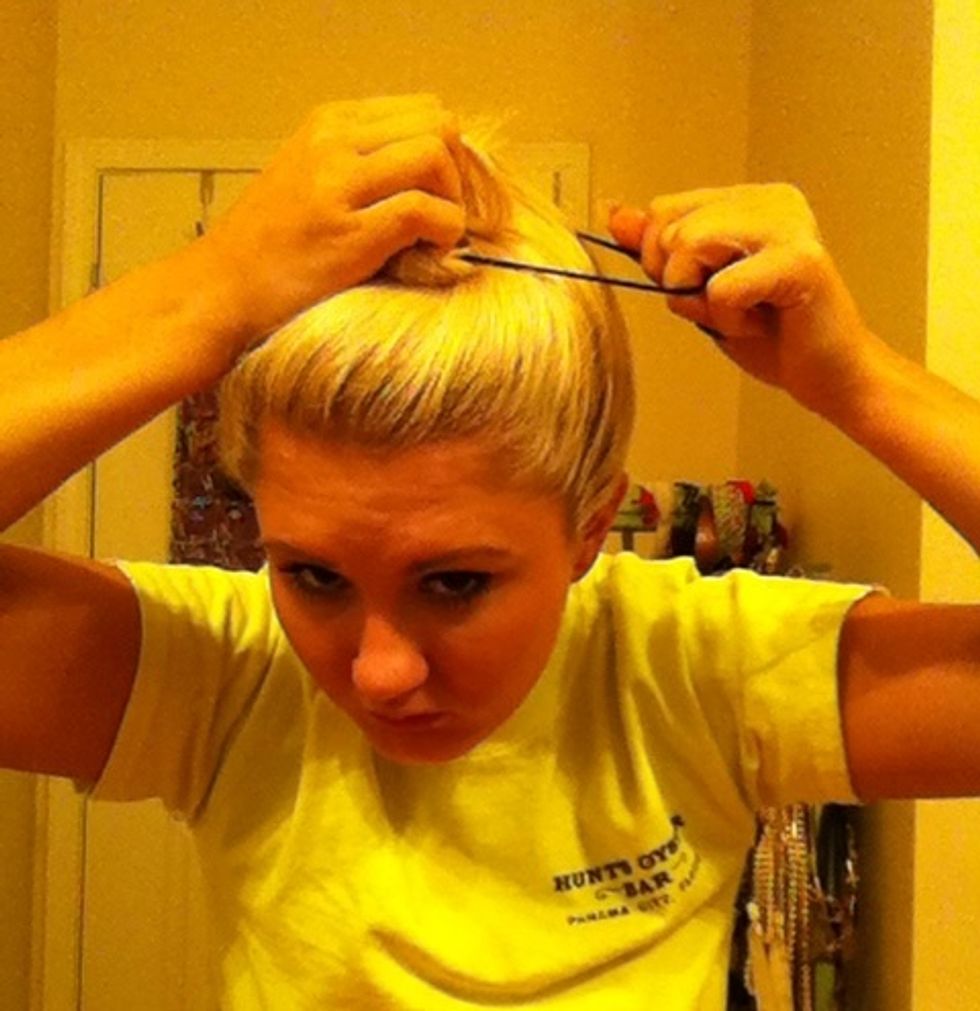 Ignore my face. Wrap completely around twice with a pony tail holder