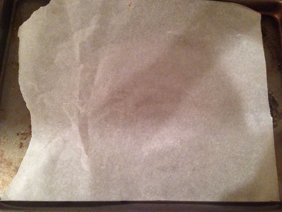 Iine a baking tray with parchment paper