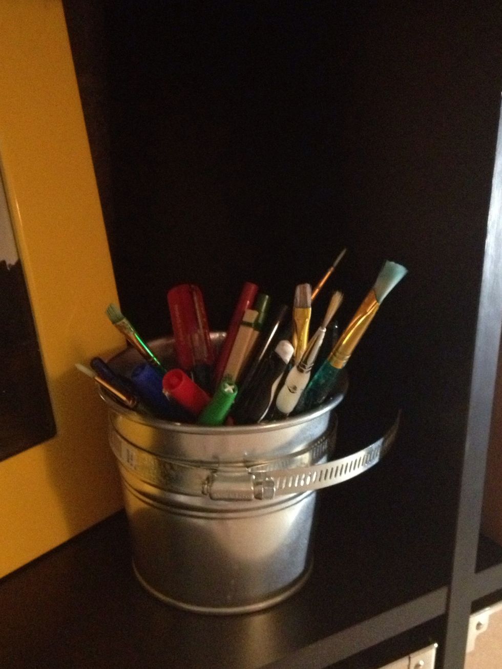 Ikea plant holder= $.79. Pipe clamp from ReStore=$.25. If you haven't checked out ReStore yet- do it! It's a great place for upcyclers and we all love Habitat 4 Humanity right?