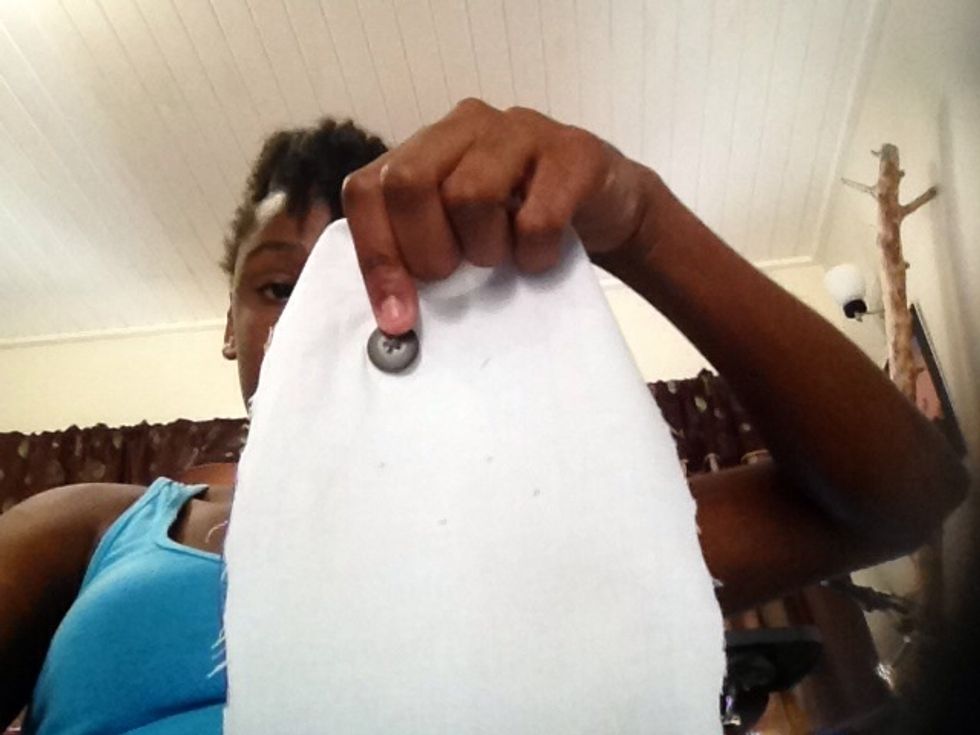 Im doing the eyes first , take your button and needle and thread