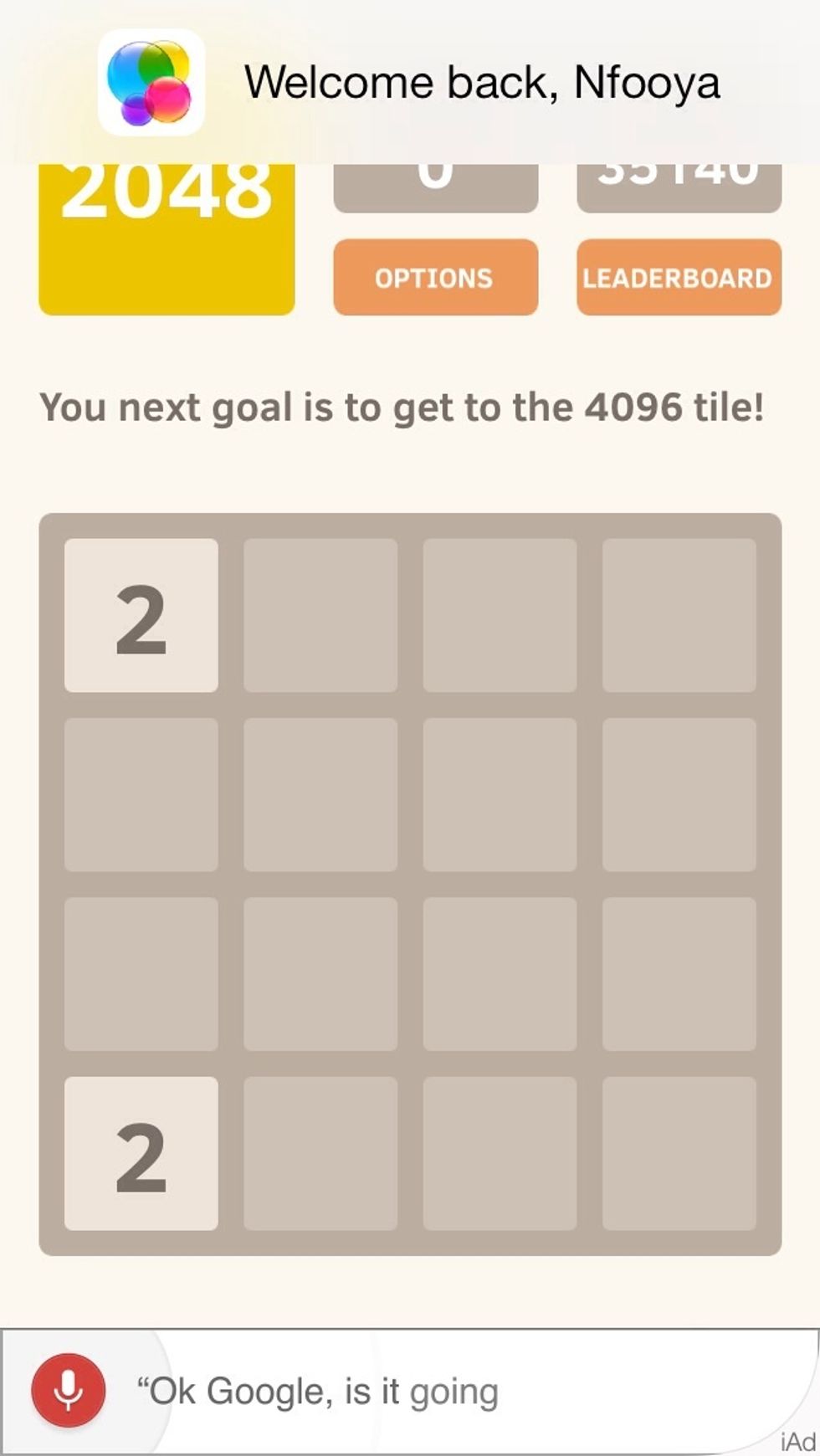 Immediately swipe down. You want to build up your digits in the bottom row. Remember: The first rule of 2048 is don't swipe up. (Unless you have no choice)