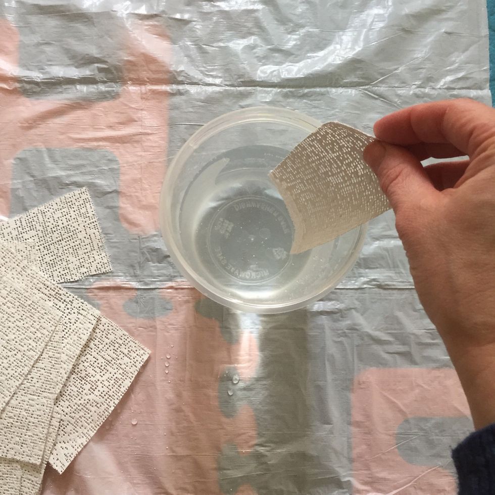 Immerse strip completely in water