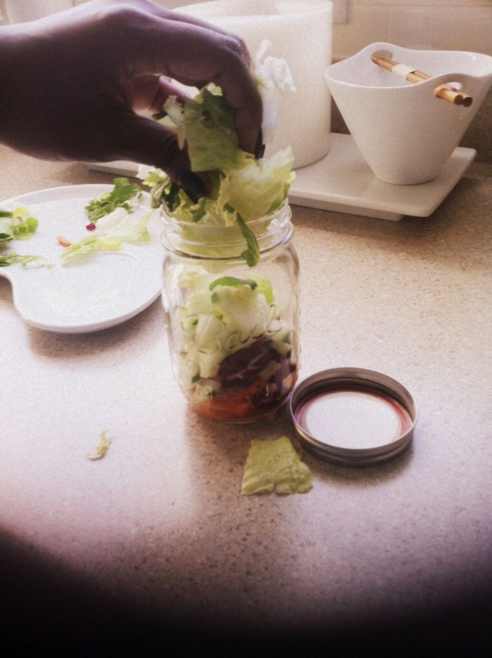 Important to add your romaine or spinach (leafy veggies) on the top layer. This will ensure that they are not touched by the dressing - Wilt-Protection!