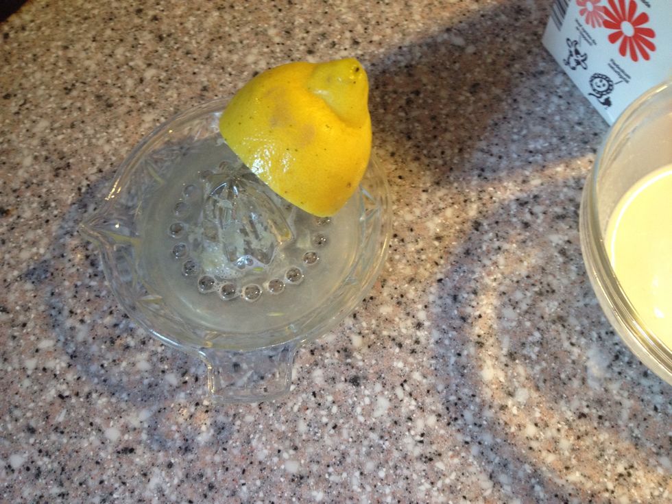 Impress 1/2 a lemon and depress the other 1/2
