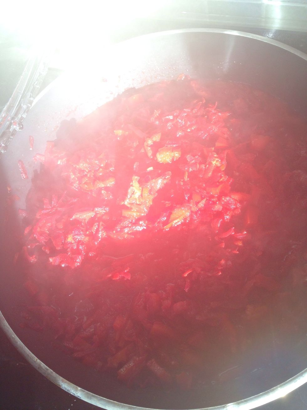 In 7 minutes add tomato pasta( you can use fresh tomatoes, but  don't forget to peel the skin off and cut them in small pieces). Add salt and cook under the cover for another 10 minutes on a low heat