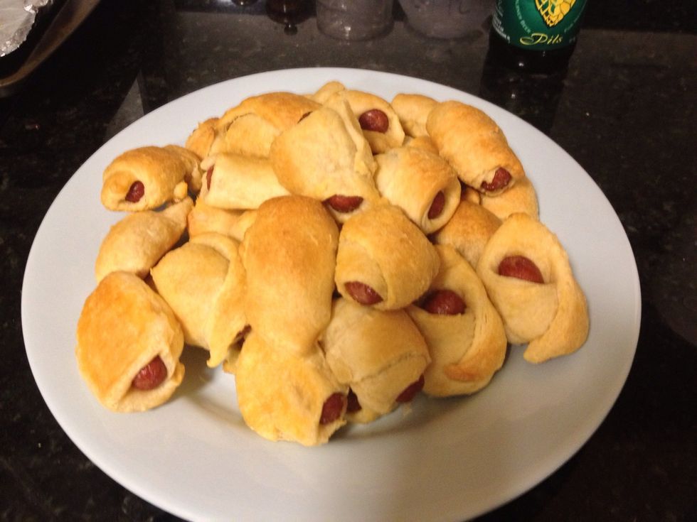 In a 375 F oven (190 Celsius), bake the baby hotdogs till golden, about 12 to 16 mins. Serve with mustard.