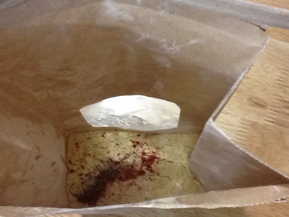 In a bag or bowl combine flour, cornmeal and spices.