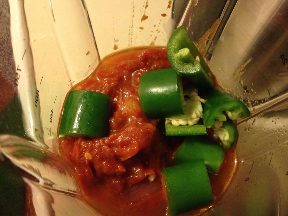 In a blender add the tomato mix and chilies. Add more chilies if you want it hotter!