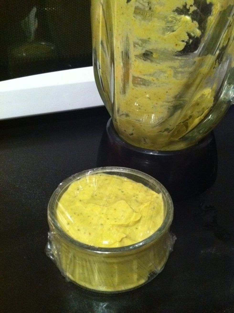 In a blender combine 1 fresh chopped mango, 1 avocado, half and half cream, 1/2 tsp of crushed chillies, cayenne powder, onion powder, chopped garlic, and 1/4 cup chopped chives. Blend till smooth.