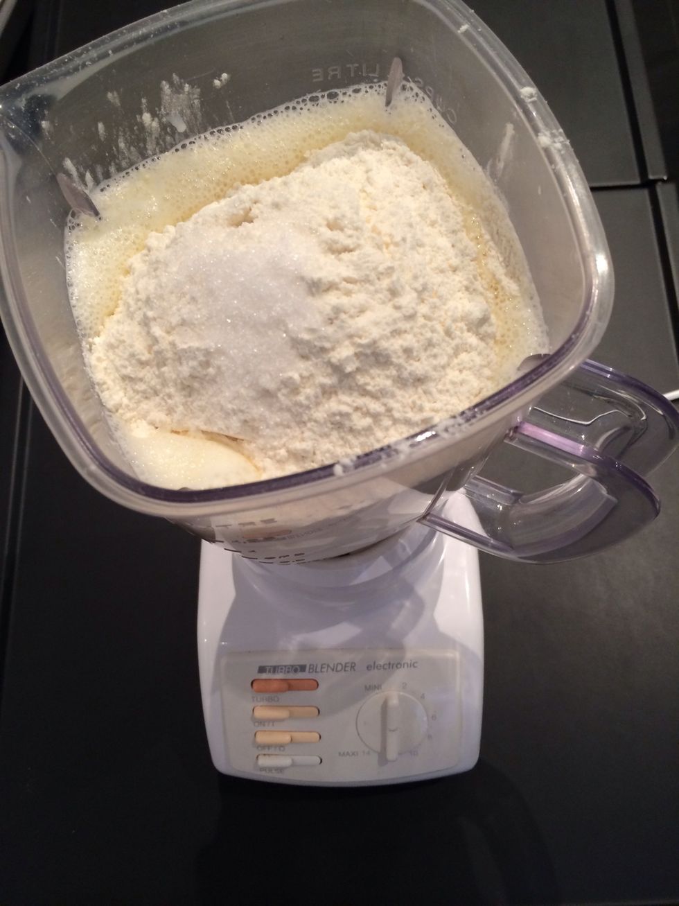 In a blender put 3 cups of milk, 1/2 cup of water, 3 large eggs and 3 TBsp oil (or 100 g melted butter): few pulses then add 2 cups of flower, a pinch of salt and a pinch of sugar mix 30 secs. Done