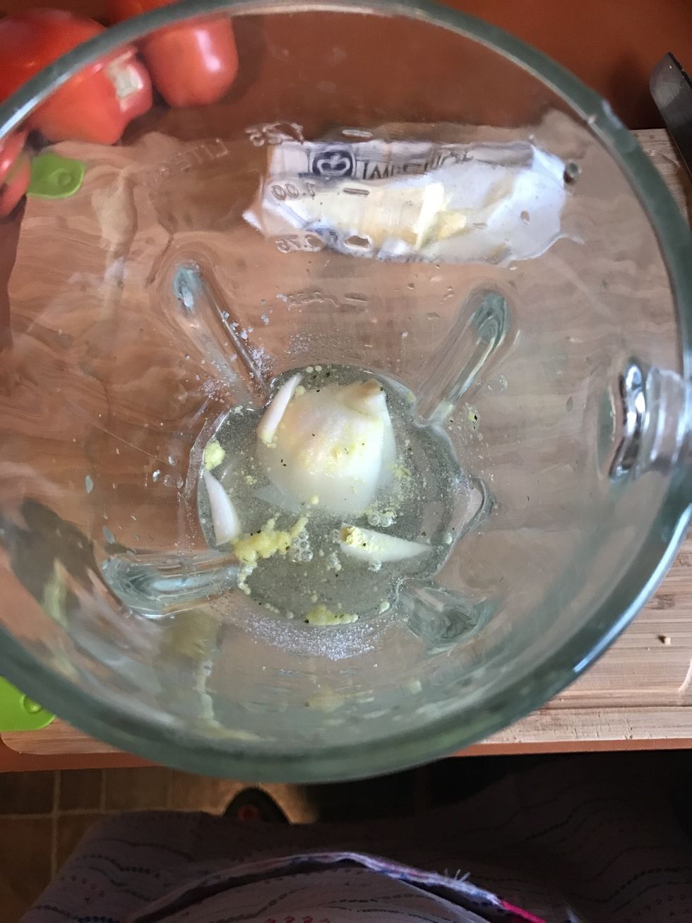 In a blender you'll add the tomatoes, salt, garlic, cup of water, onion and chicken flavor bouillon