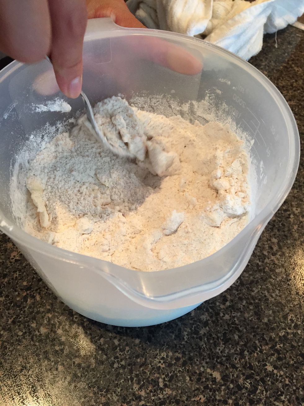 In a bowl add in 2 cups flour, 1/2 granulated sugar, brown sugar, baking soda, salt,cinnamon, nutmeg, and 1/2 cup of butter