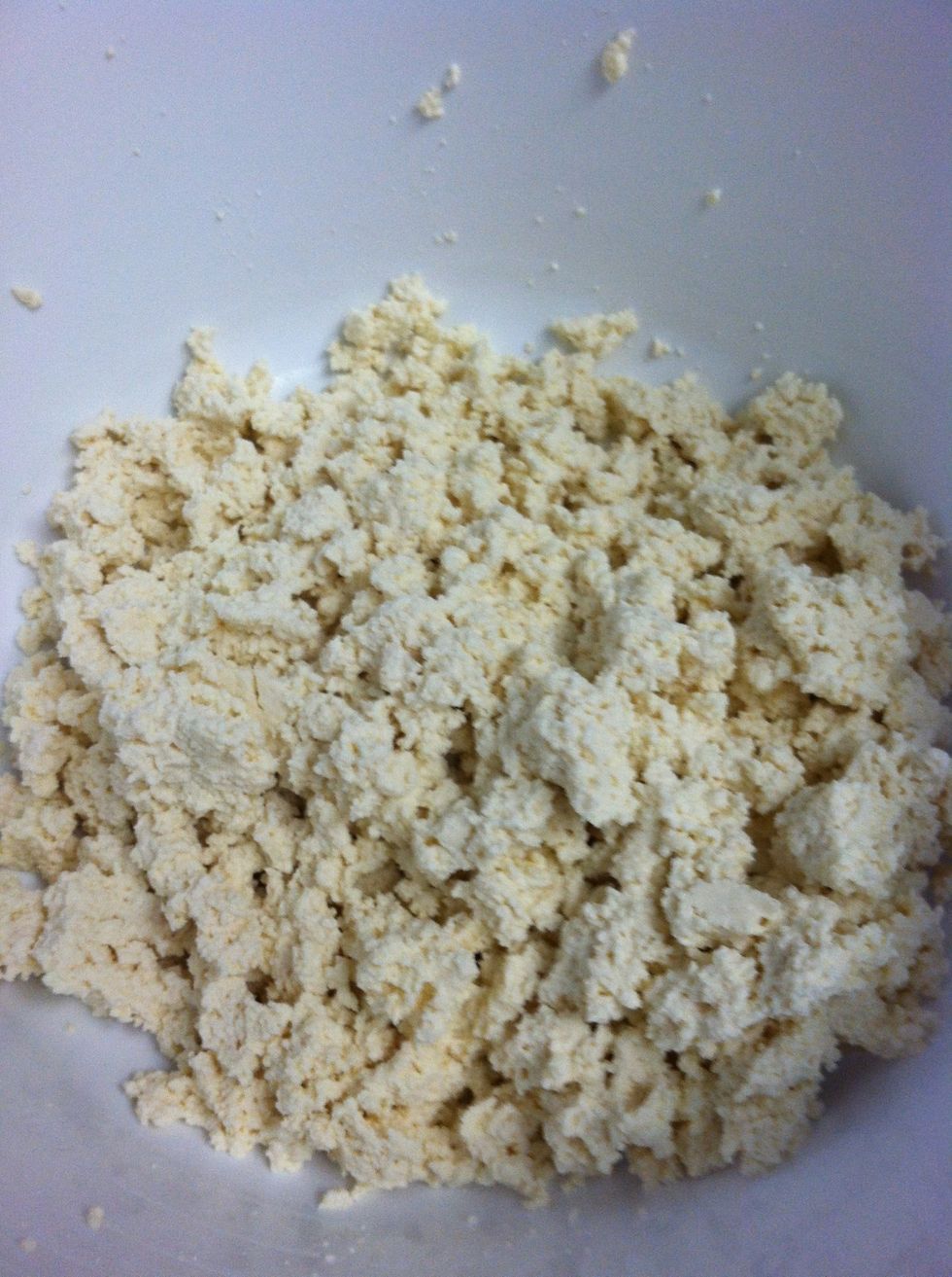 In a bowl, break up the tofu (don't be afraid to use your hands!)